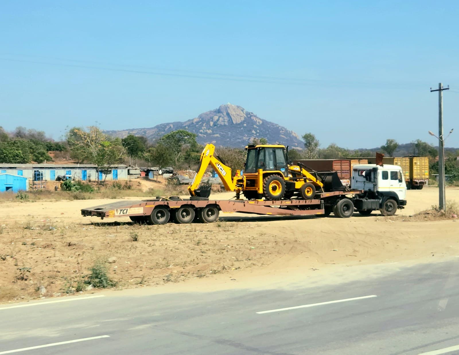 Heavy lorry with trailer on a highway in Tamil Nadu, India — no people or readable plates